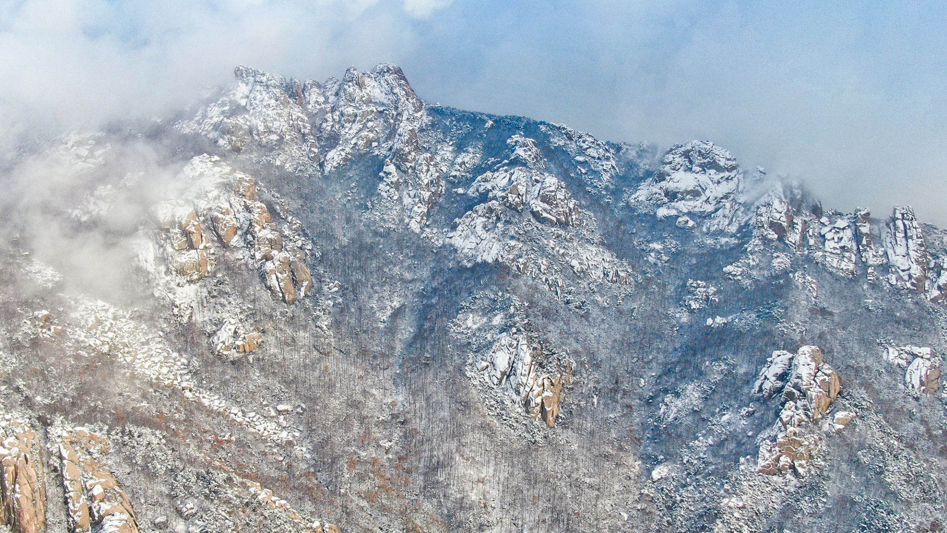 崂山巨峰雪景图片图片