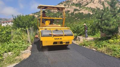 改善路面13.7公里，崂山区率先完成农村公路攻坚行动任务