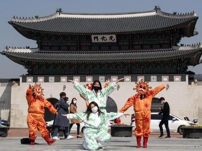 韩国单日新增确诊病例降至两位数