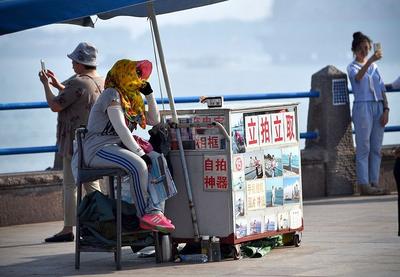 你拍过栈桥快照吗？现在还有四五十个摊位