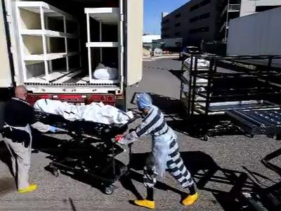 停尸房爆满！美国一城市招募囚犯处理新冠患者尸体，每小时报酬2美元