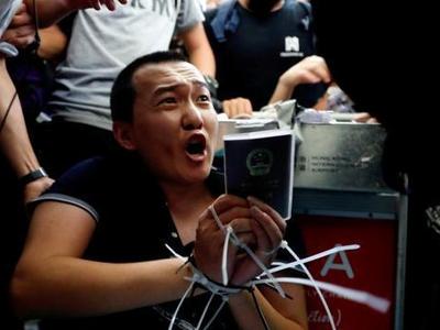 付国豪香港机场遇袭案：3名被告分别判囚4年3个月至5年半