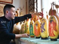 年味浓 手艺人葫芦烙画庆新春