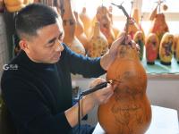 年味浓 手艺人葫芦烙画庆新春