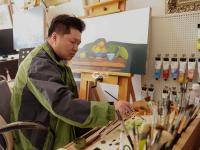 就地过年  画家村里翰墨飘香