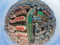 五彩涂鸦画上墙，青岛老楼春日换“新衣”