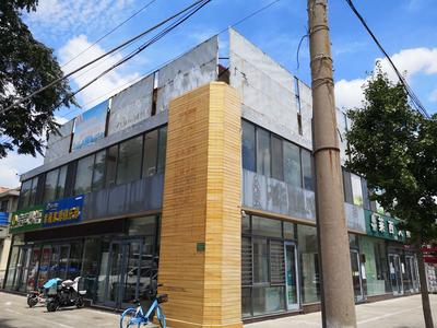 记者在现场|街区建筑广告喷绘缺失 市民呼吁整治