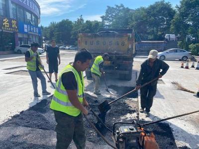 崂山区路面微整治开先河，开整属市政道路红线范围外、隶属小区产权的不平路面
