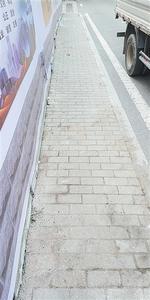 青岛日报曝光台回访行动 |  清理占道杂物、更换故障信号灯……这些学校周边环境已改善