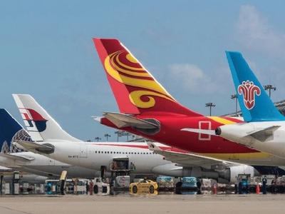 上海两大机场：13日零时起，八成以上进出港航班将调减取消