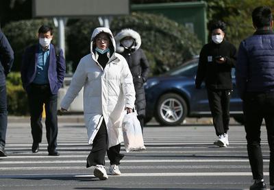 “冻”真格！寒潮之下行人全副“捂”装