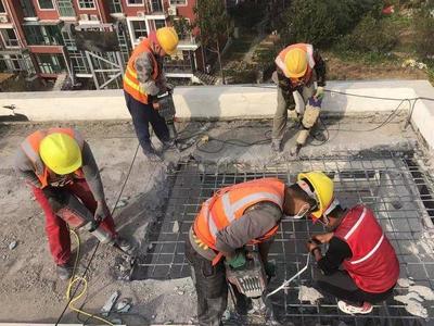 崂山区一18年小区拆除楼顶违法搭建阳光房、楼顶搭建平台40余处、900余平方米
