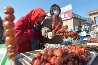 糖球、脂渣……城阳河套大集，真香