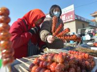 糖球、脂渣……城阳河套大集，真香