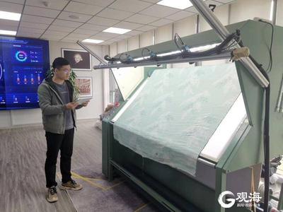 这家年轻的青岛AI企业，研发出世界首台能检验花布品质的AI验布机	