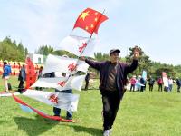 蓝天做衬！15只“帆船”遨游汇泉广场上空