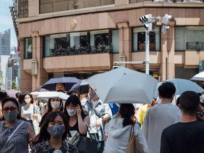日本单日新增新冠确诊病例近21万例，创历史新高