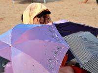 来浴场洗海澡？亮出你的“遮阳神功”