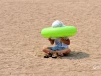 来浴场洗海澡？亮出你的“遮阳神功”