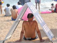 来浴场洗海澡？亮出你的“遮阳神功”