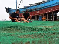 秋季开渔在即，渔民修船补网静候大丰收