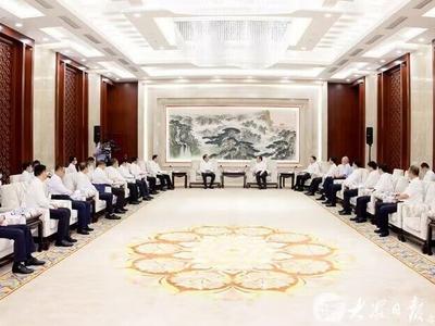 李干杰周乃翔会见国家电网客人