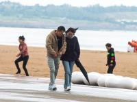 冷空气“到货”了！街拍行人抗寒“表情包”