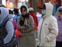 “换季式”大降温！实拍青岛街头御寒百态