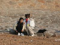 遛娃、垂钓……青岛海滨冬日“暖镜头”来了