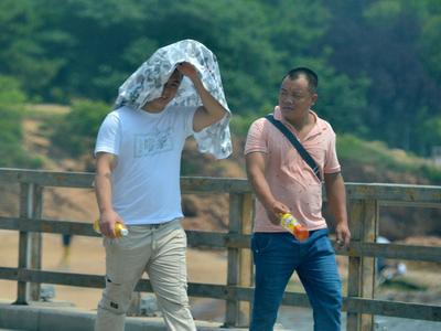 东北地区迎降雨鼎盛期，南方多地高温闷热感明显