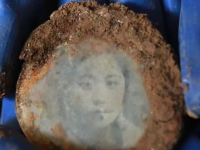 一睹真容！烈士紧握82年的照片被成功修复