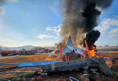 韩国客机碰撞起火事故已致96人死亡