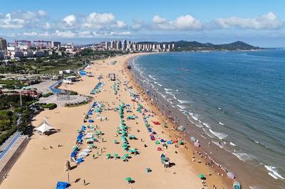 海上冲浪、沙滩排球、浴场集市、海景酒吧……青岛海水浴场下月全部开放