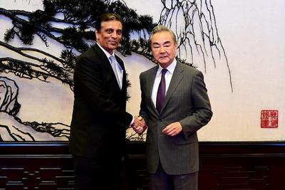 王毅会见美中贸易全国委员会董事会代表团