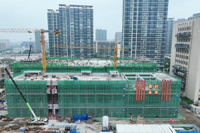 中国联通青岛国际局通信枢纽楼全面封顶，为北方唯一新增国际通信枢纽