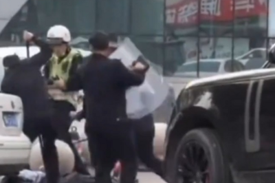 越野车车主撞向街头挥刀男子，专家解读：属正当防卫