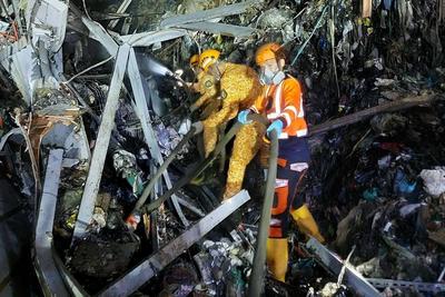 菲律宾垃圾场塌陷事故已致36人死亡