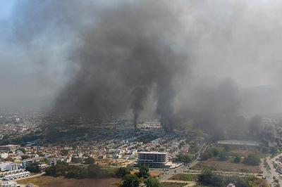 墨西哥贩毒集团报复行动致27名安全人员死亡