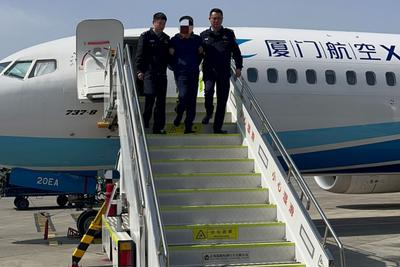 涉嫌骗取贷款超6.6亿元，一名嫌疑人被押解回国