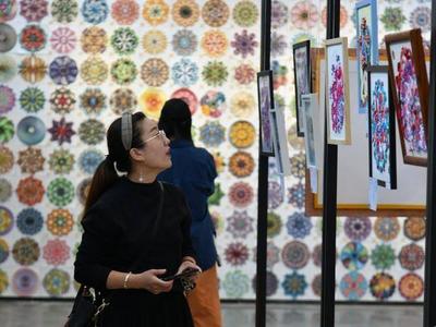 央媒看青岛 | 《人民日报》关注青岛百年纺织蝶变记