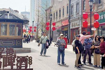 ​打个“飞的”来青岛，入境游客变“常客”