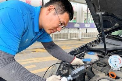 ​青岛机动车检测一线战高温、斗酷暑，全力保障车辆安全上路