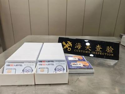青岛胶东机场海关查获违规携带入境，电话卡522张